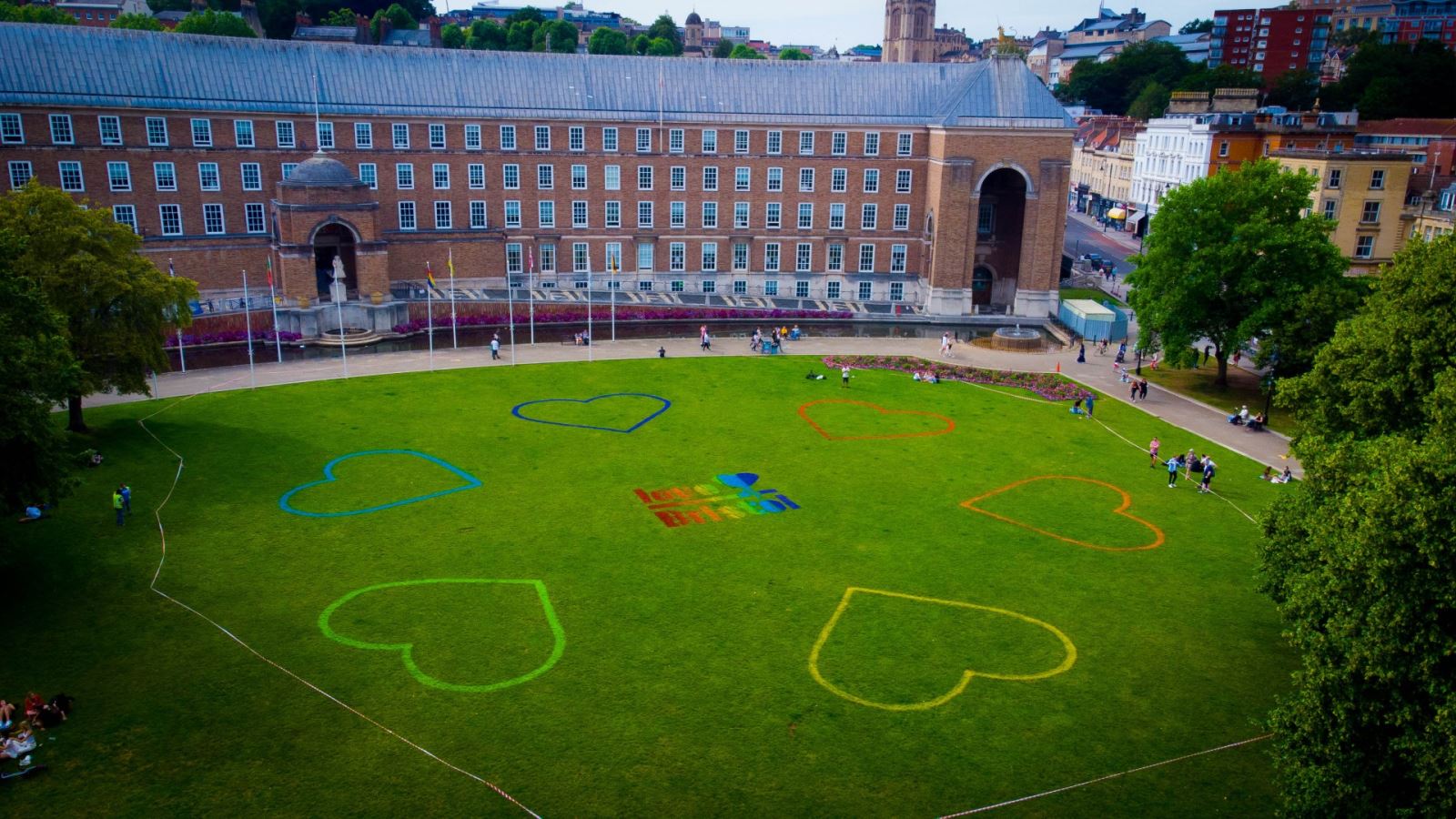 Love Bristol and multi-coloured hearts painting on College Green, in front of City Hall